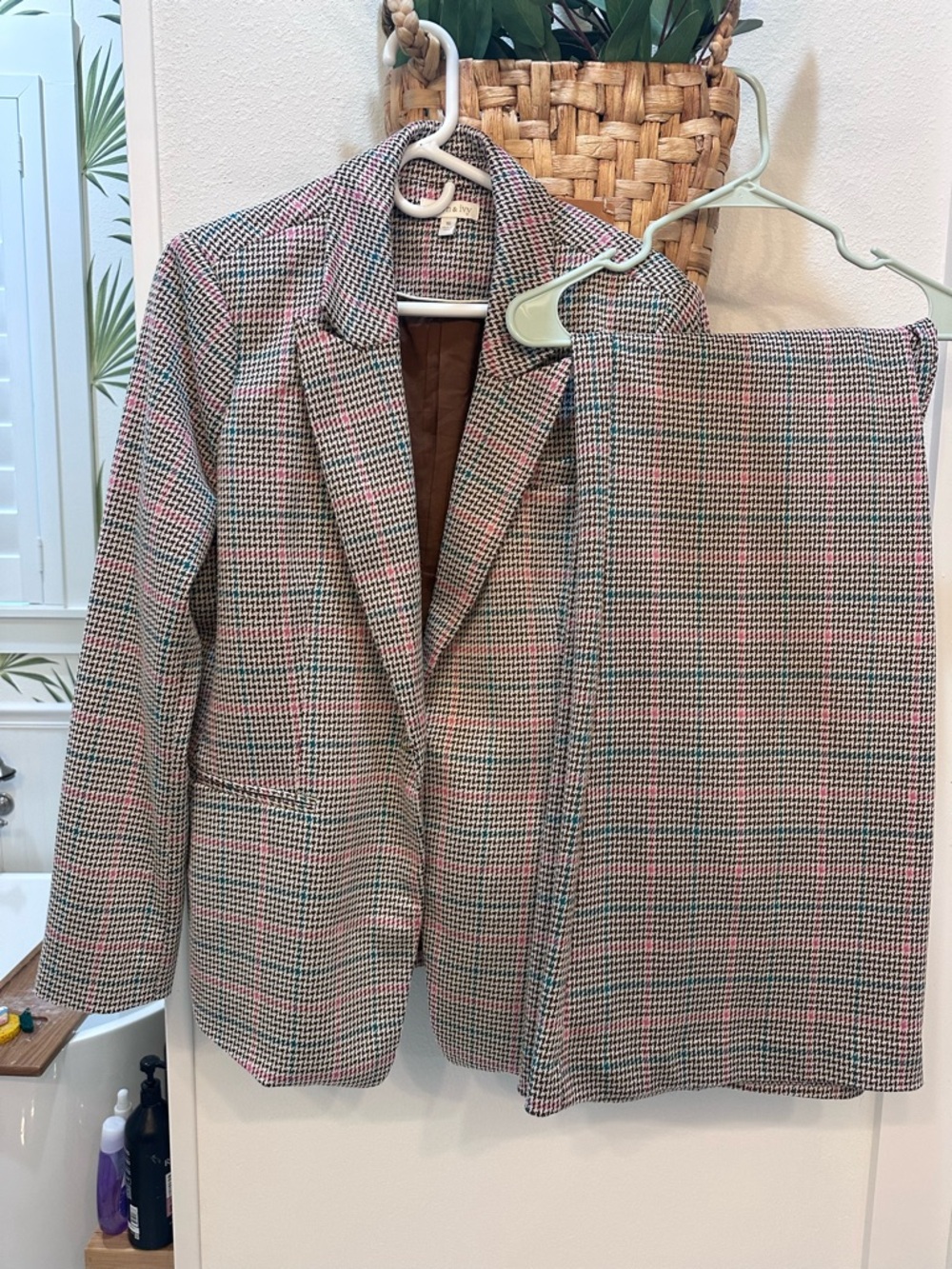 Beautiful two piece crown and Ivy women’s suit in brown, pink and teal.